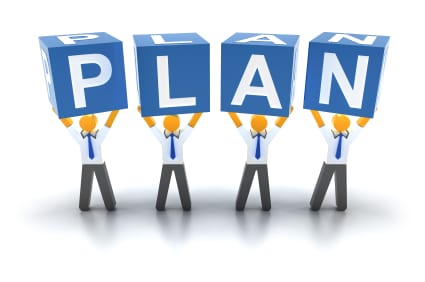 IT planning letters held up by small people cartoon