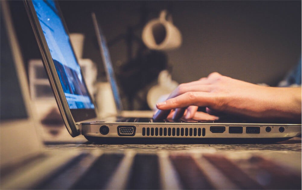 Man checking email on business computer